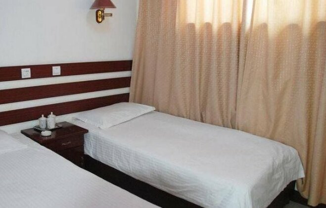 Qufu Huancheng Guest House - Photo4
