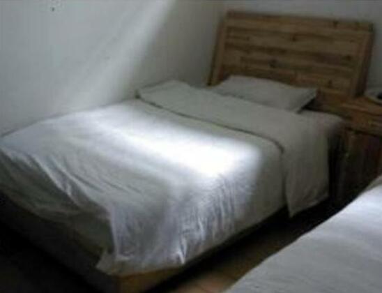 Qufu Ruiyuan Business Inn - Photo5