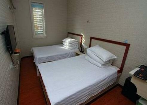 Qufu Shengrun Inn - Photo2
