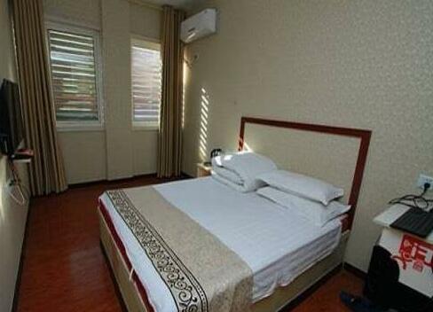 Qufu Shengrun Inn - Photo4