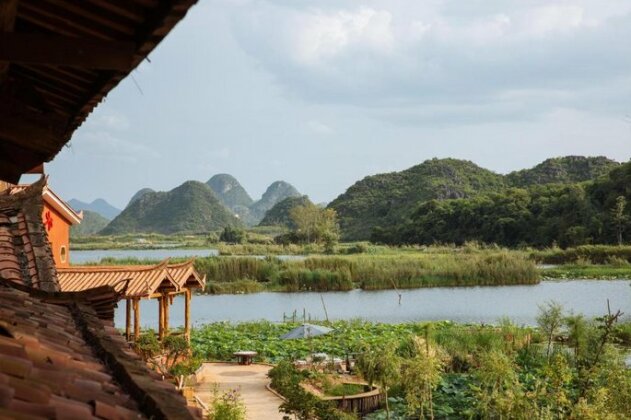 Puzhehei Yanhu Guesthouse - Photo3