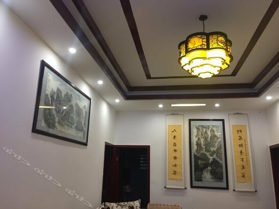 Xiaobaicai Guesthouse - Photo2