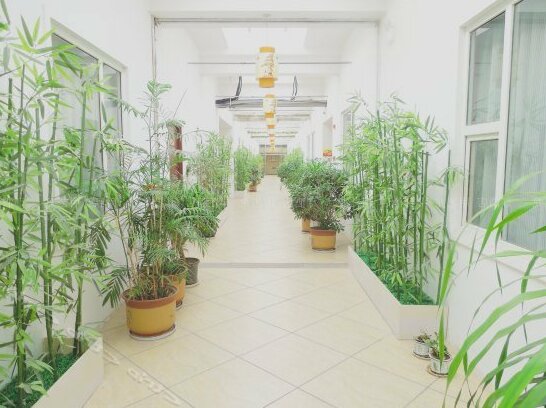 Huagang Holiday Hotel - Photo4