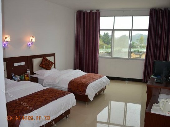 Xiaoqikong Xiangcaoyuan Hotel - Photo4