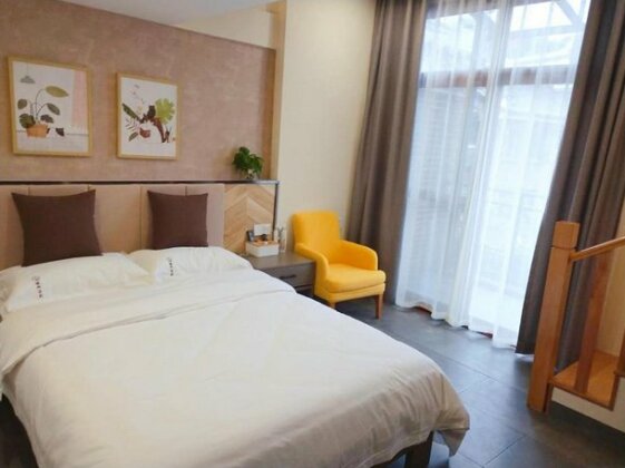 Yumen Guesthouse - Photo2