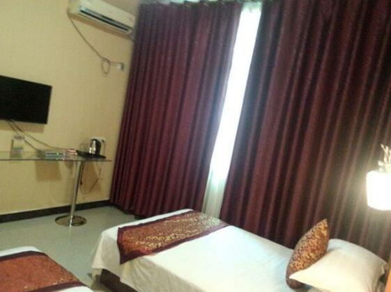 Yuping Hongrui Inn - Photo3