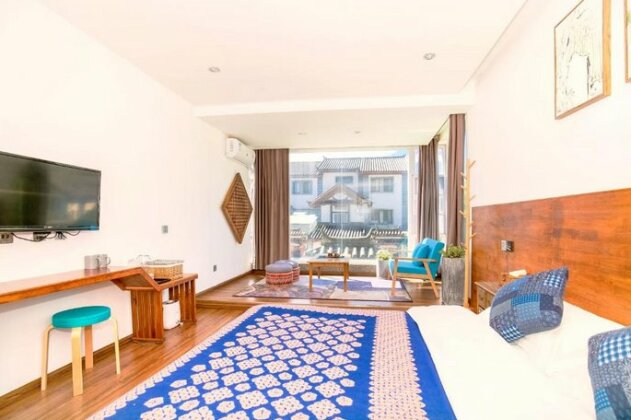 Lijiang Family Holiday Villa Hotel - Photo2