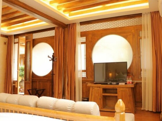 Lijiang Happyland Inn - Photo5