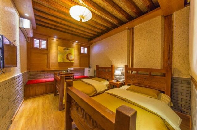 Lijiang Laia Zhuangse Inn - Photo5