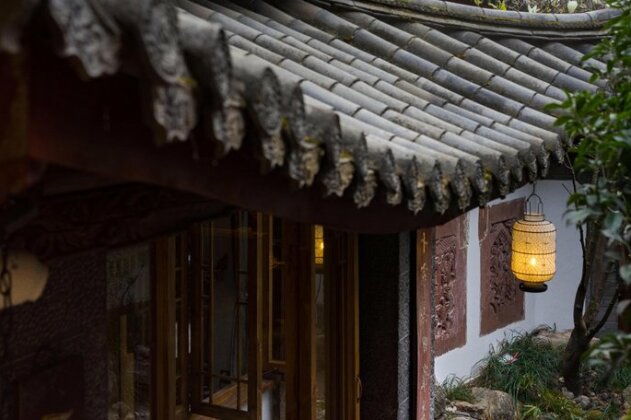 Lijiang Runjing Wenchanggong Hotel Previous Lijiang Zen Garden Hotel-Lion Hill Yard - Photo2