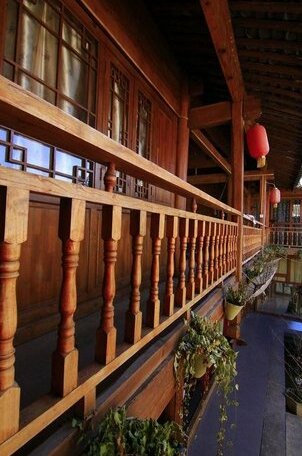 Lijiang Shuhe Shi Wu Wan Hostel - Photo2