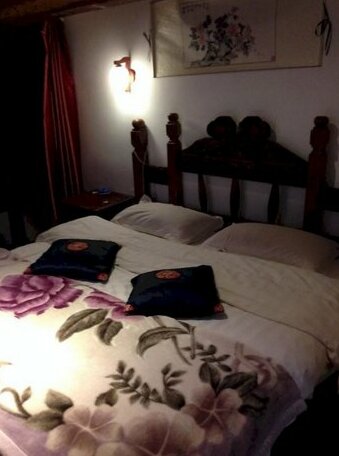 Lijiang Wuwei Life Courtyard Inn - Photo2