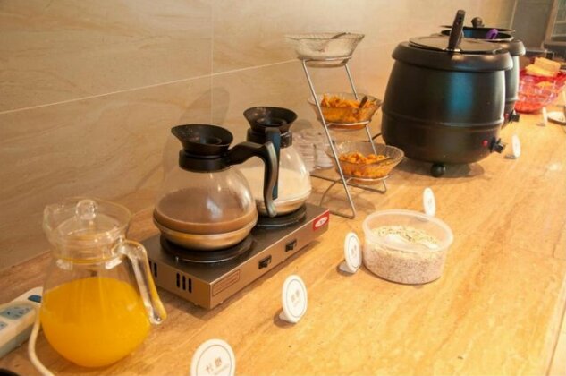 Lijiang Xing Cheng Hotel - Photo2