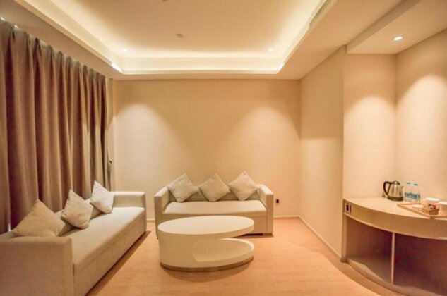 Lijiang Xing Cheng Hotel - Photo3