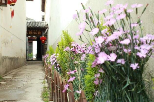 Lijiang Yixin Garden Theme Inn - Photo4