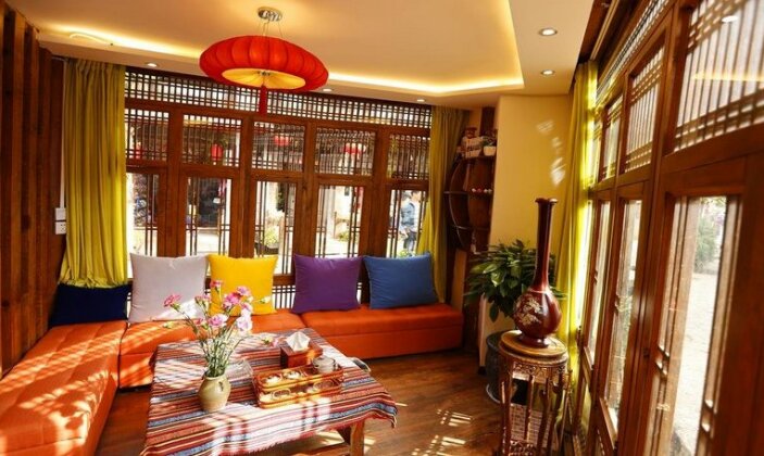 Mulan Courtyard Hotel - Photo3