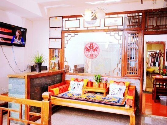 Two Cattle Inn Lijiang - Photo3