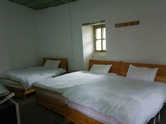 Yongding Classic Earth Building Qiaofu Inn - Photo3