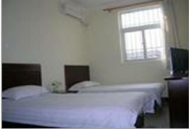 Family Inn Luoyang - Photo2