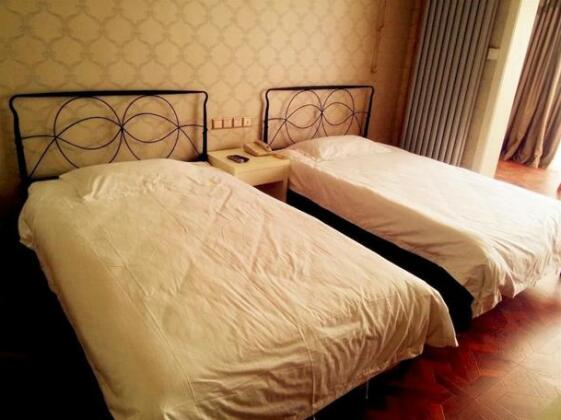 Longbai Business Hotel - Photo2
