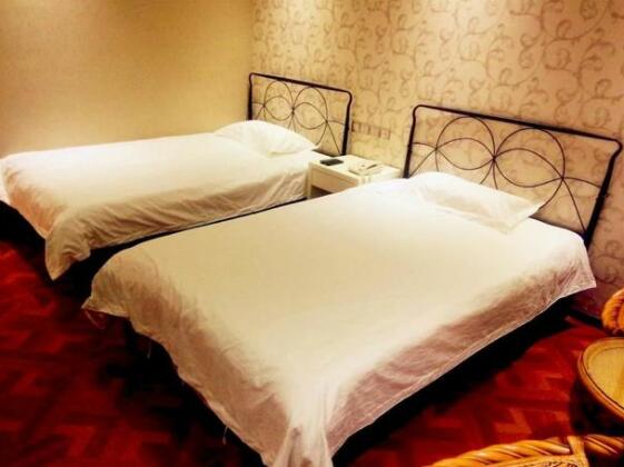 Longbai Business Hotel - Photo4