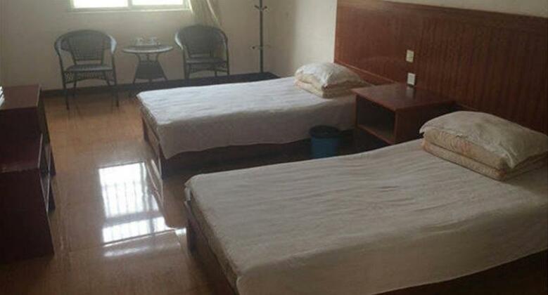 Qingnian Inn - Photo2