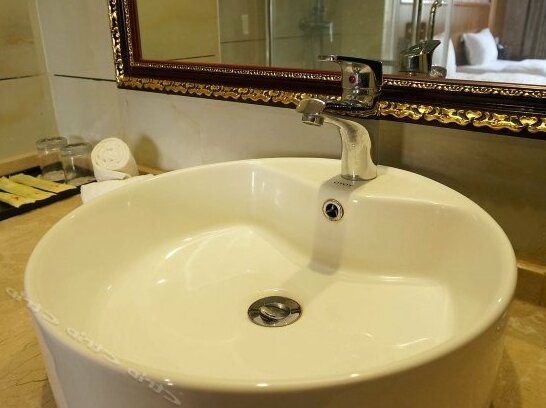 Naxin Holiday Hotel - Photo2