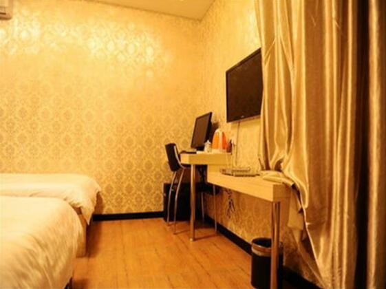 Mudanjiang Three Centimeters Holiday Hotel - Photo4