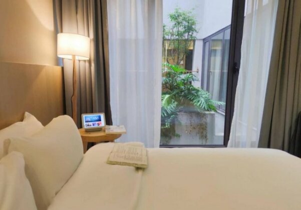 Flower Inn Nanjing - Photo2