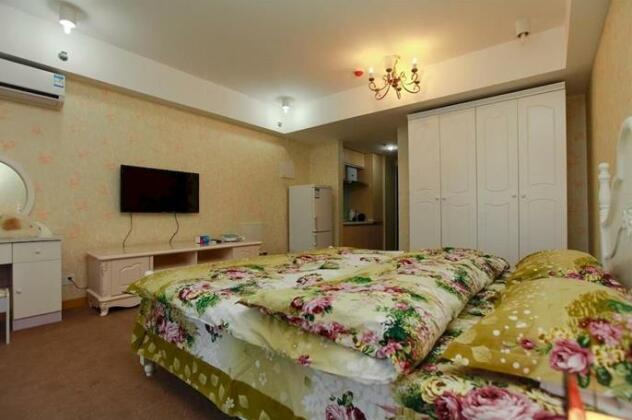 Hui Ke Xing Hotel Apartment - Photo2