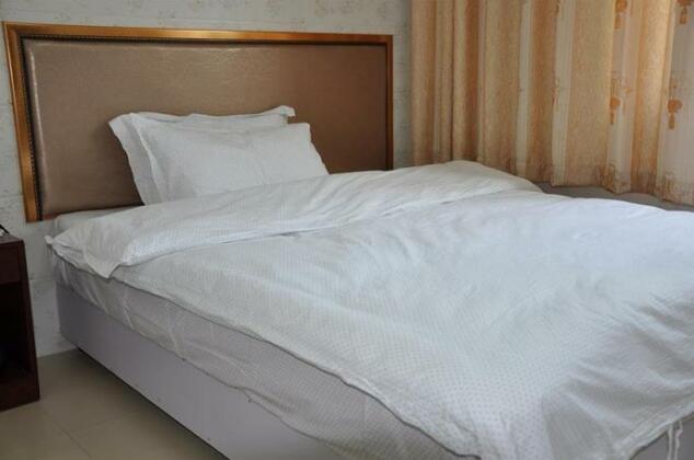 Ken Ding Hotel Jiangning Yiwu - Photo4