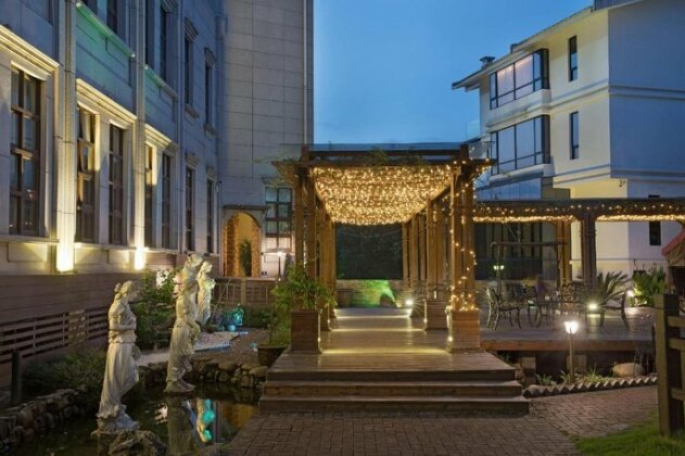 Lucky Garden Holiday Smart Hotel - Photo2