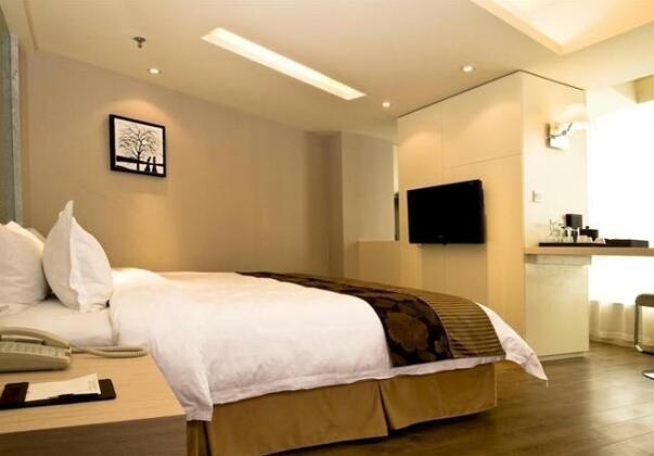 Ritz Hotel Ningbo - Photo4