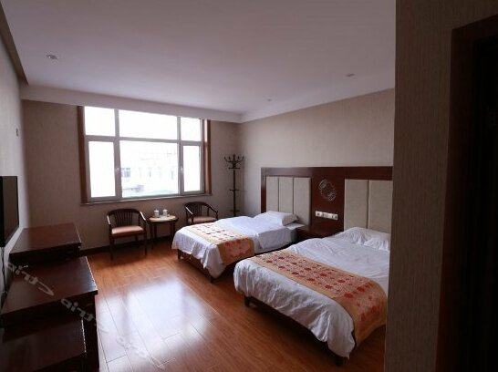 Caoyuanqing Hotel - Photo2