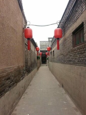 Cheng Shi Ge Hotel - Photo2