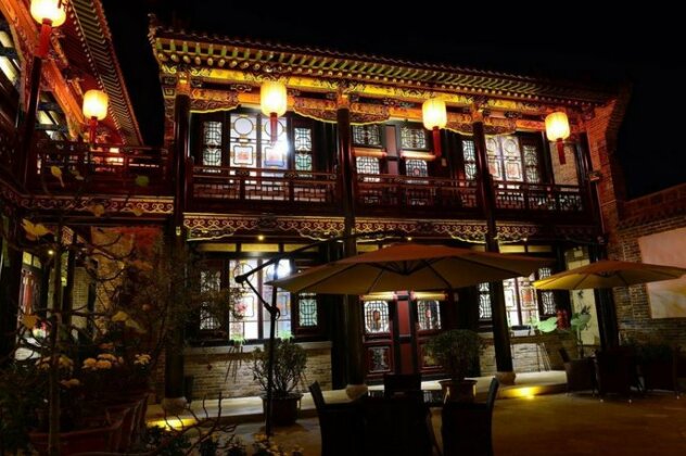 Cheng Shi Ge Hotel - Photo3