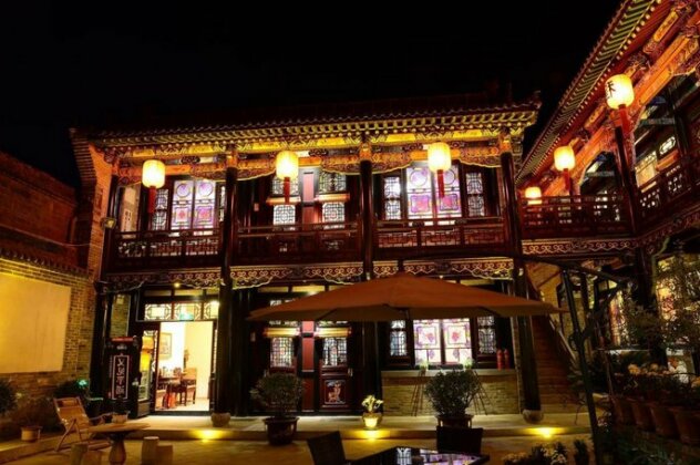 Cheng Shi Ge Hotel - Photo4