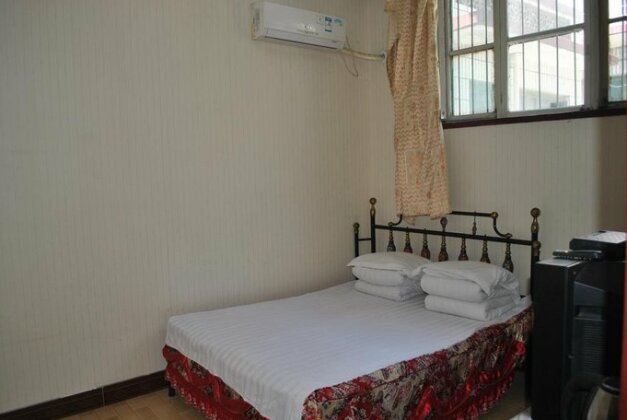 Pingyao Jiuhe Guesthouse - Photo5