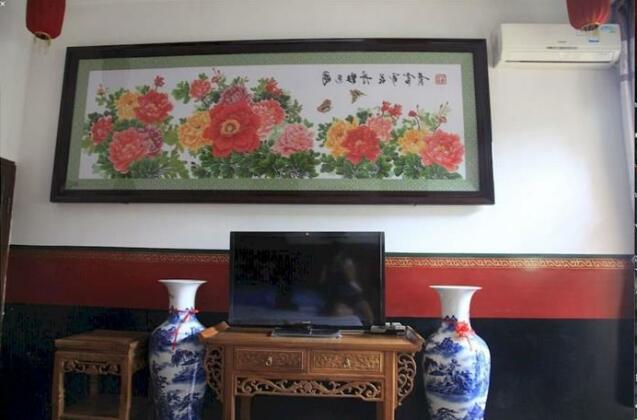 Qiu's Inn - Photo4