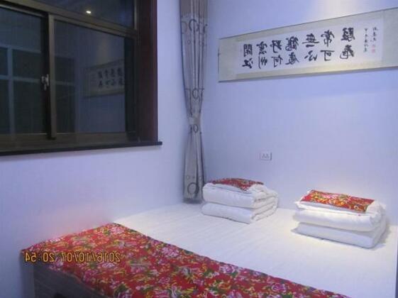 Xinwanyi Hotel - Photo5