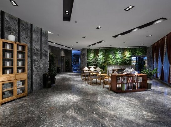 Huayi Boutique Hotel - Photo2