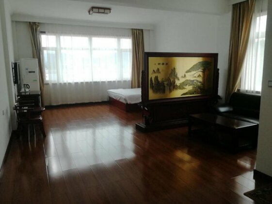 Yixin Leisure Home Hotel - Photo4