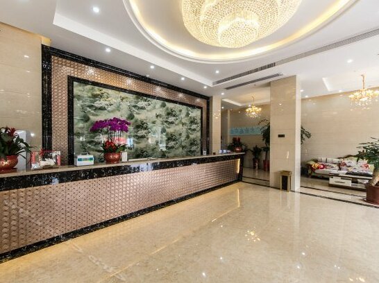 Wanhao Caifu Hotel - Photo3