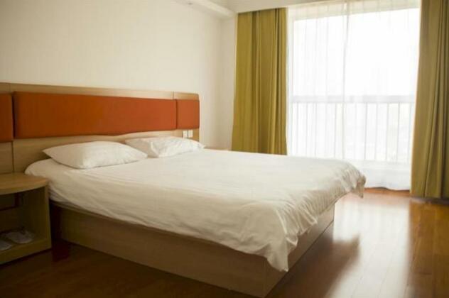 Ankerui Holiday Inn Qingdao Stone Man Branch - Photo4