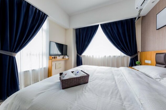Begonia Hotel Qingdao - Photo3