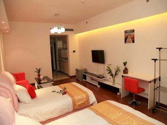 Donghai Home Holiday Apartment - Photo5