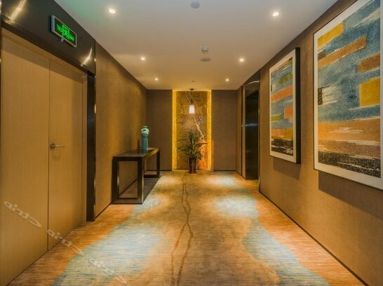 Elegance Hotel Qingdao - Photo4
