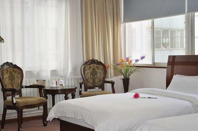 Hai Qi Business Hotel - Photo2