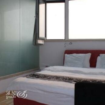 Man Cheng Hostel Qingdao Xin Taian Road - Photo3