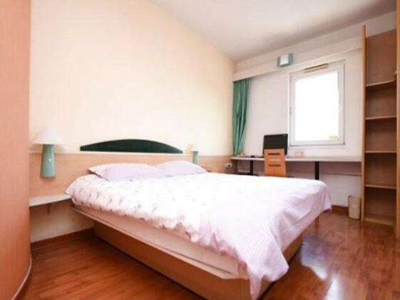 Motel Qingdao Licang Square - Photo5